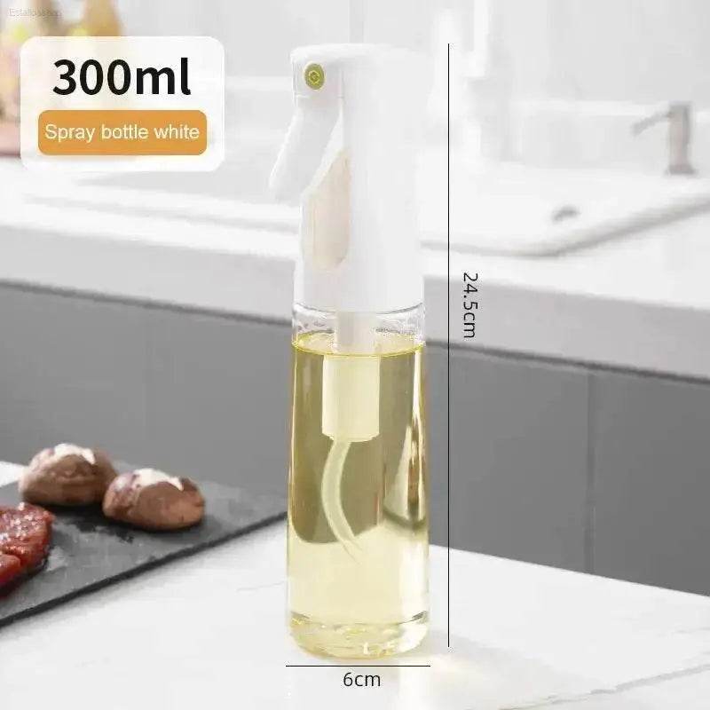 Clear spray bottle with white pump.