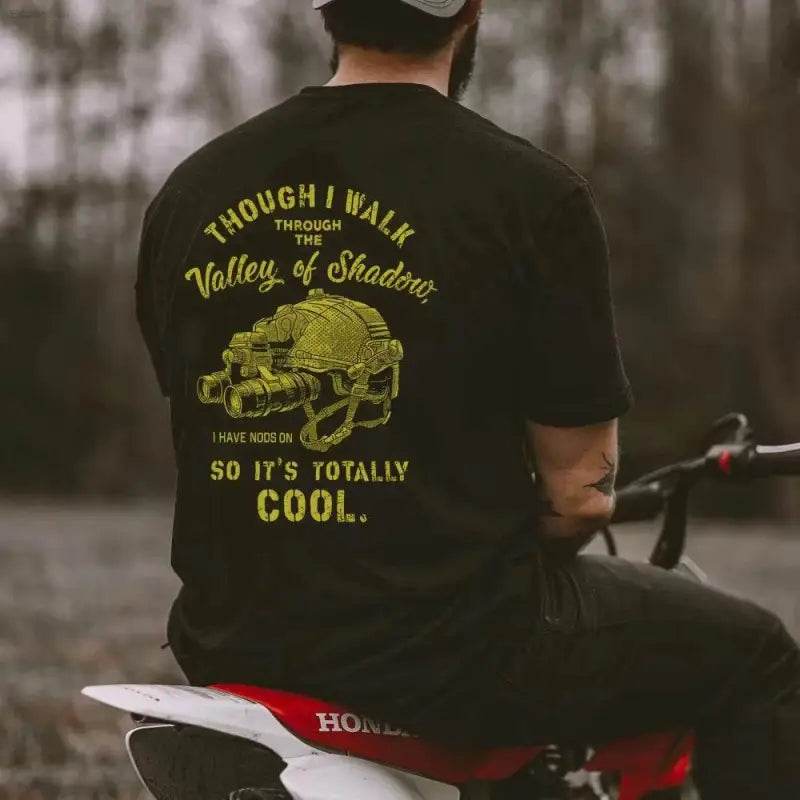 Black t-shirt with a humorous graphic.