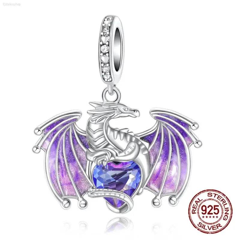 Silver dragon charm with purple wings and heart-shaped gemstone.