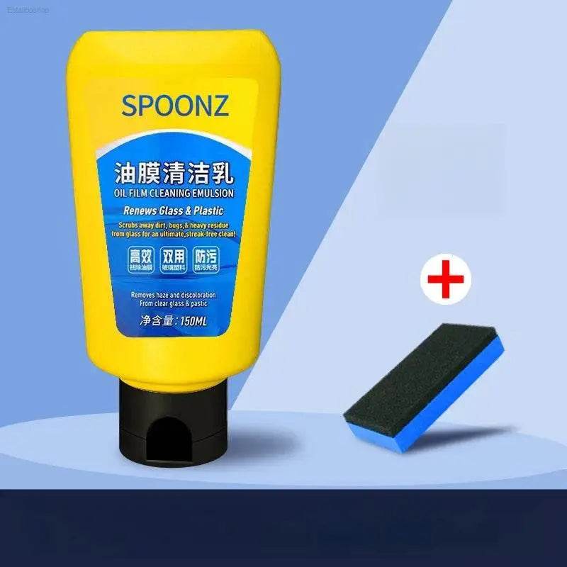 Yellow bottle of glass and plastic cleaner with applicator.