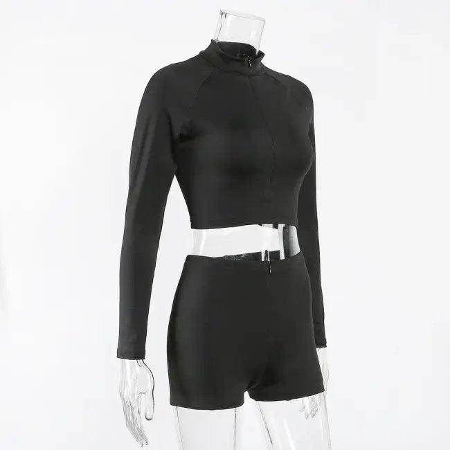 Amp Up Your Workout in the Bold Black Crop Set - Estalios