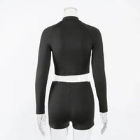 Amp Up Your Workout in the Bold Black Crop Set - Estalios