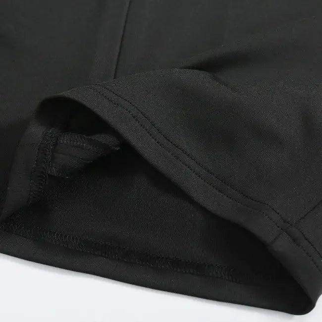 Amp Up Your Workout in the Bold Black Crop Set - Estalios