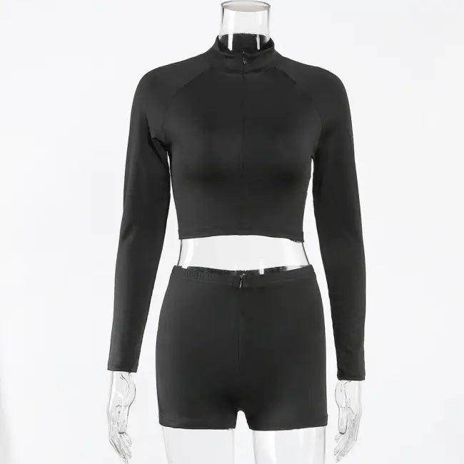 Amp Up Your Workout in the Bold Black Crop Set - Estalios