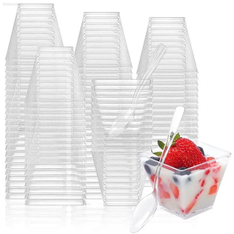 Clear plastic dessert cups with spoons.