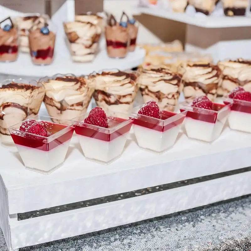 Dessert cups with raspberries.