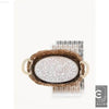 Oval owl-themed tray in a woven basket.