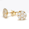 Gold and diamond stud earrings.