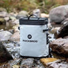 White waterproof bag with black trim.