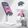 Adjustable phone stand with charging hole.