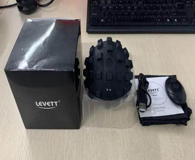 Revitalize Your Muscles with the Black Remote Massage Ball - Estalios