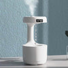 White humidifier with digital display.
