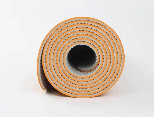 Amp Up Your Practice with the Bold Orange Gray Yoga Mat - Estalios