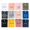 Folded t-shirts in various colors.