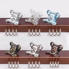Assorted metal and clear plastic window latches with screws.