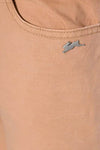 Peach-colored pants with a rabbit logo.