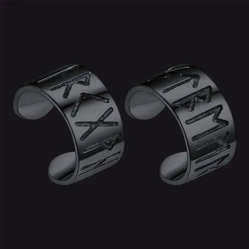 Two dark metal rune rings.