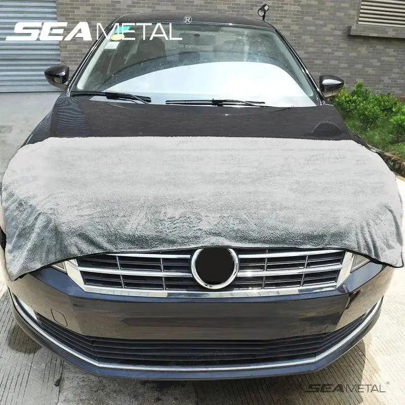 Car covered with protective cloth from Estalios Car Supplies, showcasing quality and care.