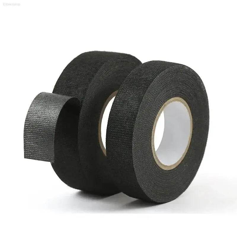 Three rolls of black cloth tape.