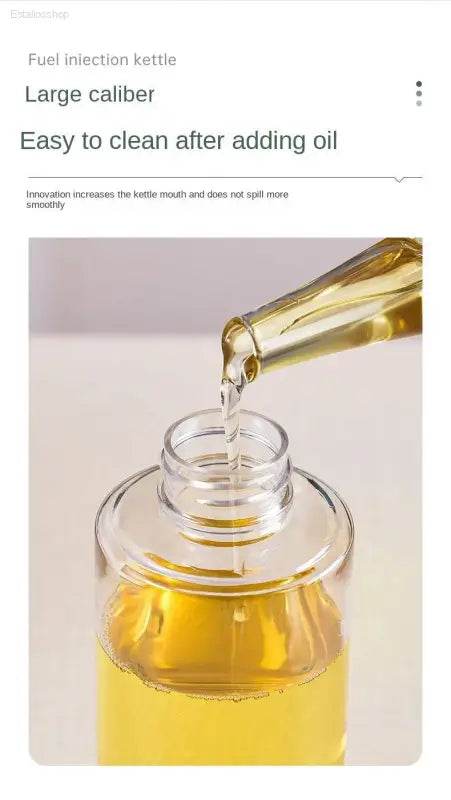 Oil being poured into a glass bottle.