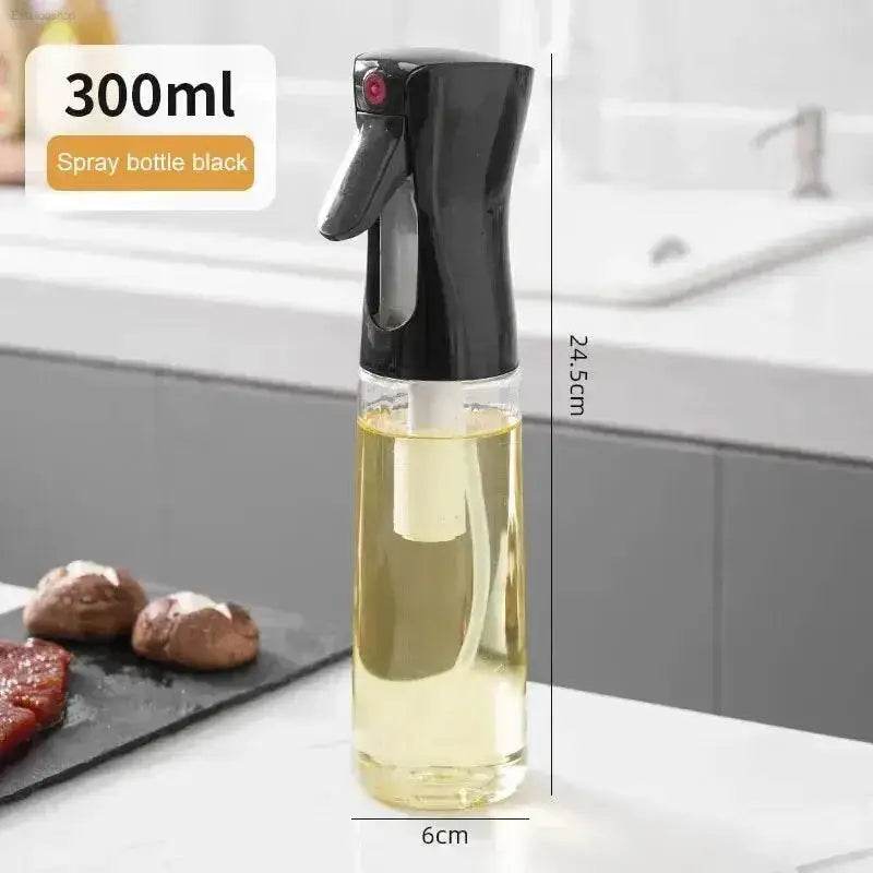 Black spray bottle with oil.
