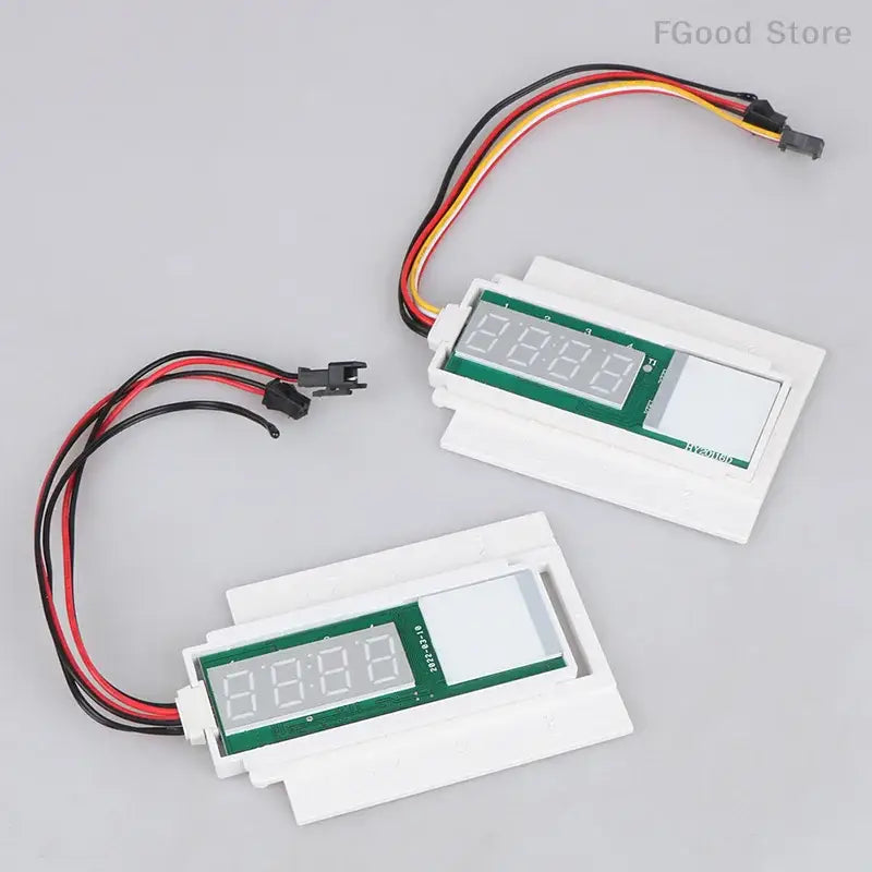 Two digital display modules with wiring for a 60W mirror lamp dimmer switch