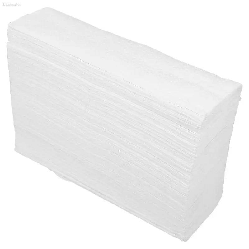 Stack of white paper napkins.