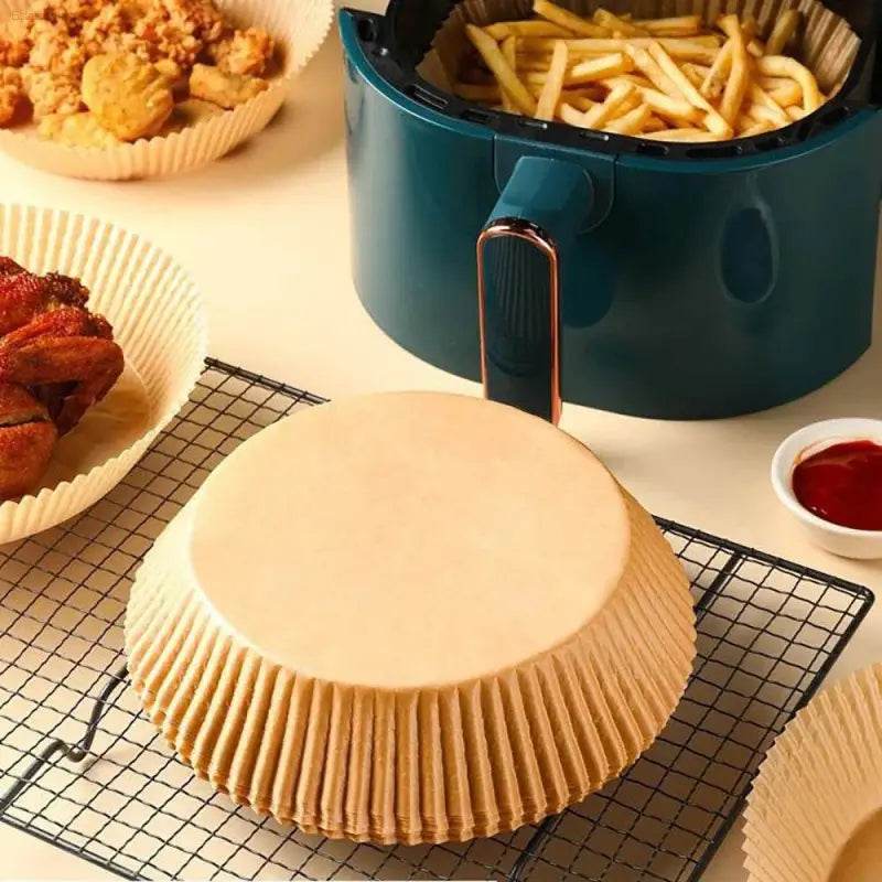 Round, pleated, disposable paper liners.