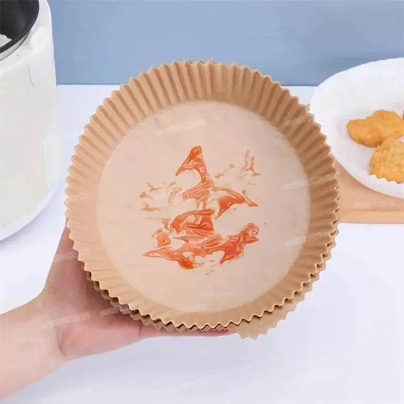 Round, disposable air fryer liners.