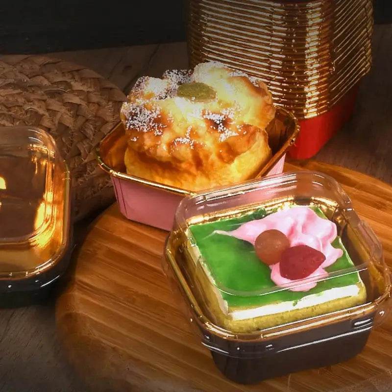 Pastries in plastic containers.