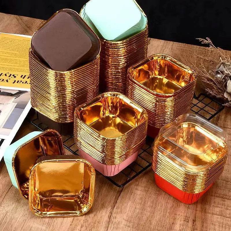 Stacks of colorful, square baking cups.