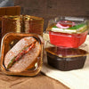 Square containers with baked goods.