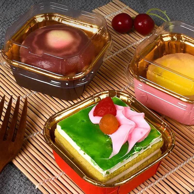 Assorted cakes in plastic containers.