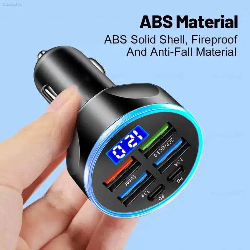 Black car charger with multiple USB ports and a digital display.