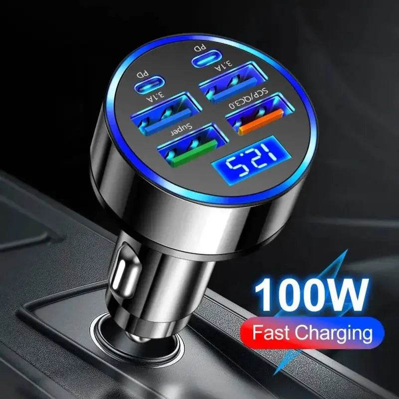 Silver car charger with multiple USB ports and digital display.