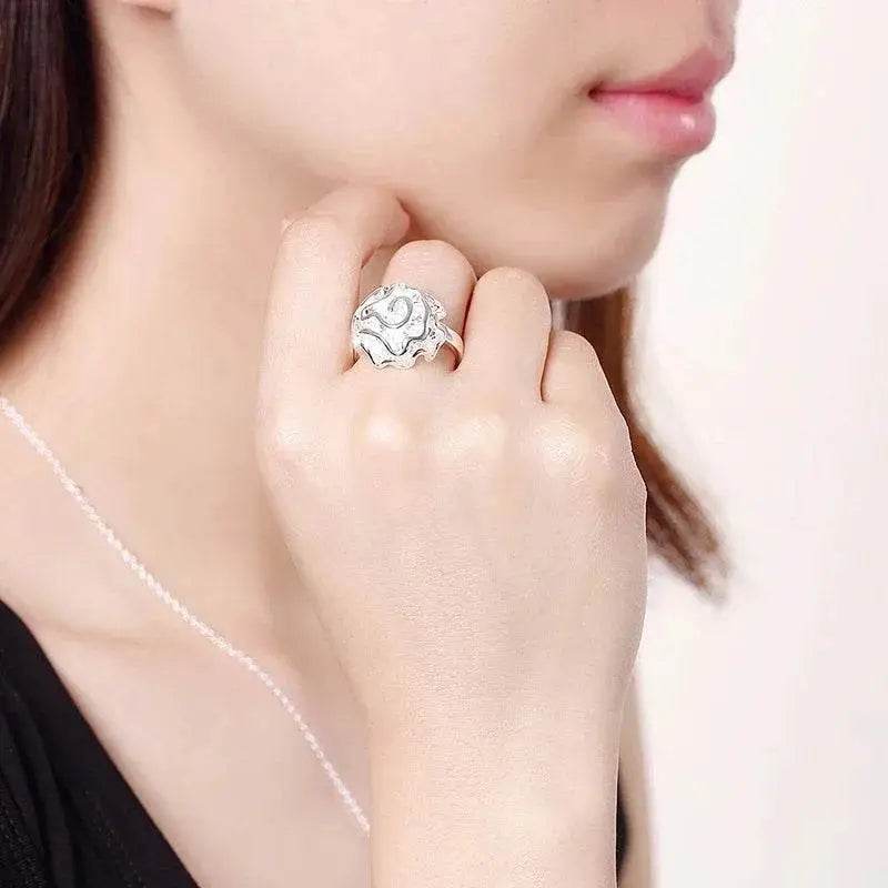 Silver filigree ring.