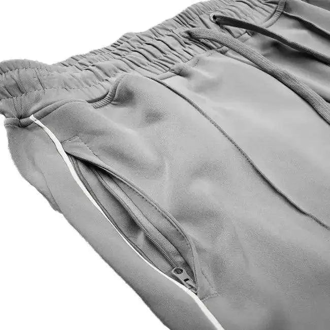 Elevate Your Workout with Gray Zip Track Pants - Estalios