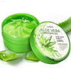 Aloe vera soothing gel in a green container.