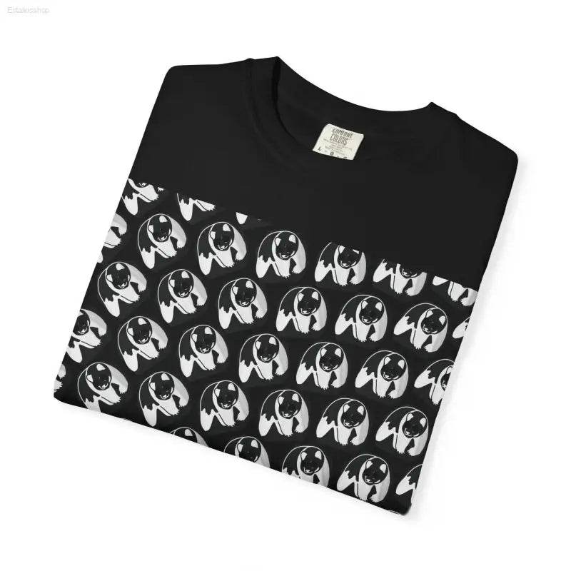 Black t-shirt with white cartoon pattern.
