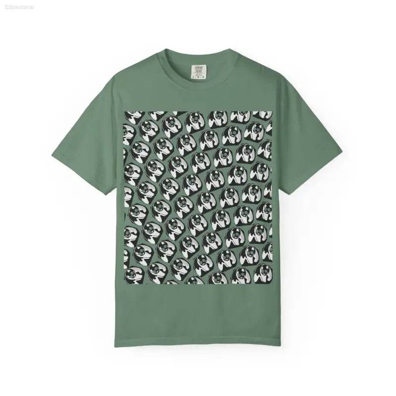 Green t-shirt with patterned graphic.