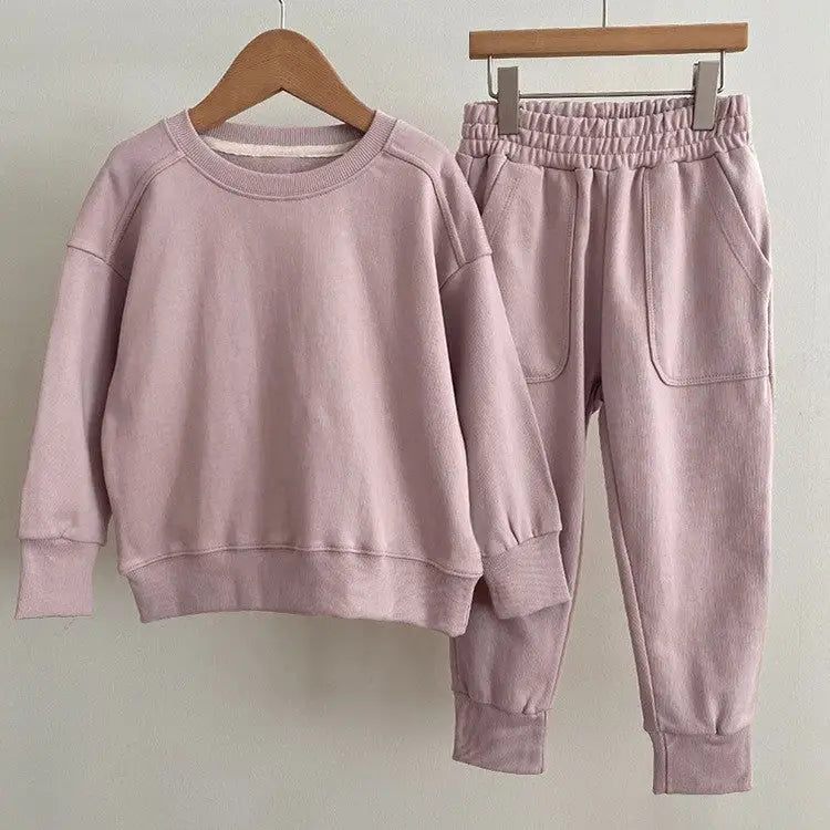 Matching mauve sweatshirt and sweatpants from Autumn Baby Kids in dark blue