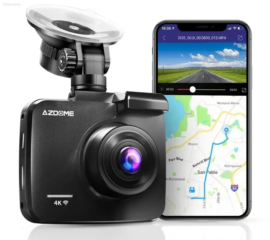 Black dashcam with suction mount and smartphone display.