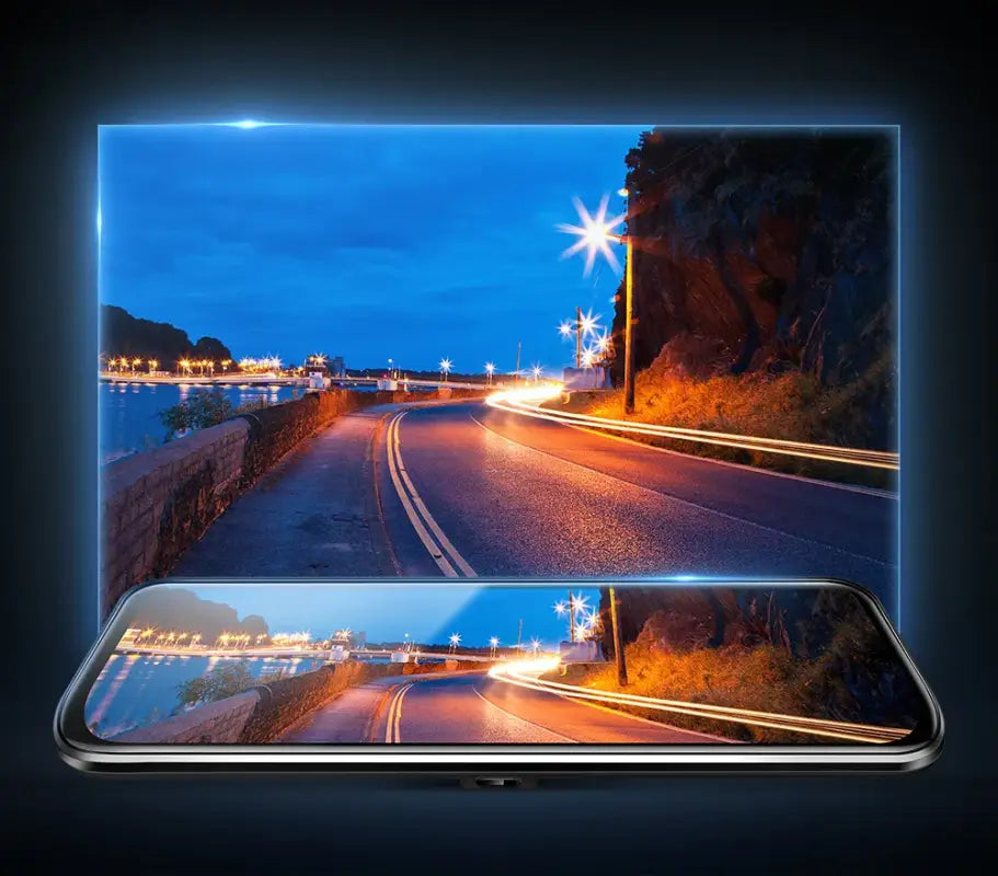 Smartphone displaying a nighttime road scene.