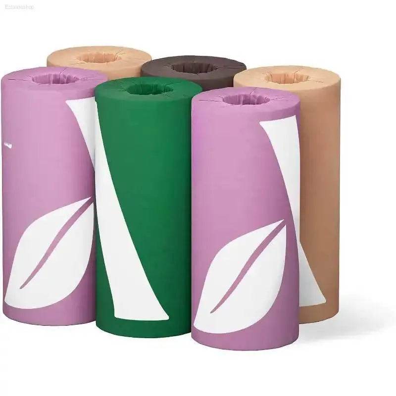 Colorful cylindrical massage table face rest covers.