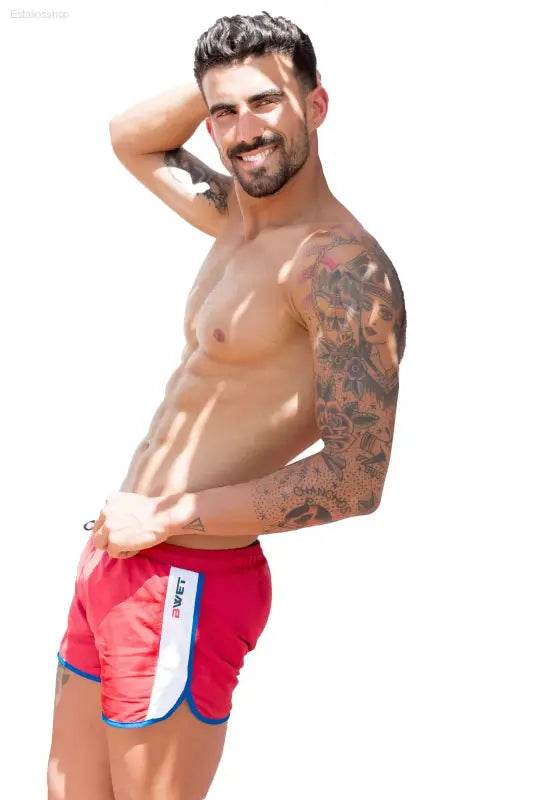 Red swim trunks with white and blue trim.