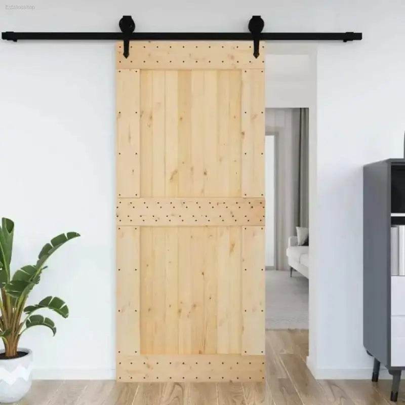 Barn Door Bliss: Black Hardware, Rustic Charm! Unleash rustic elegance with our Wooden Barn Doors, complete with sleek black hardware. These doors instantly transform - Estalios