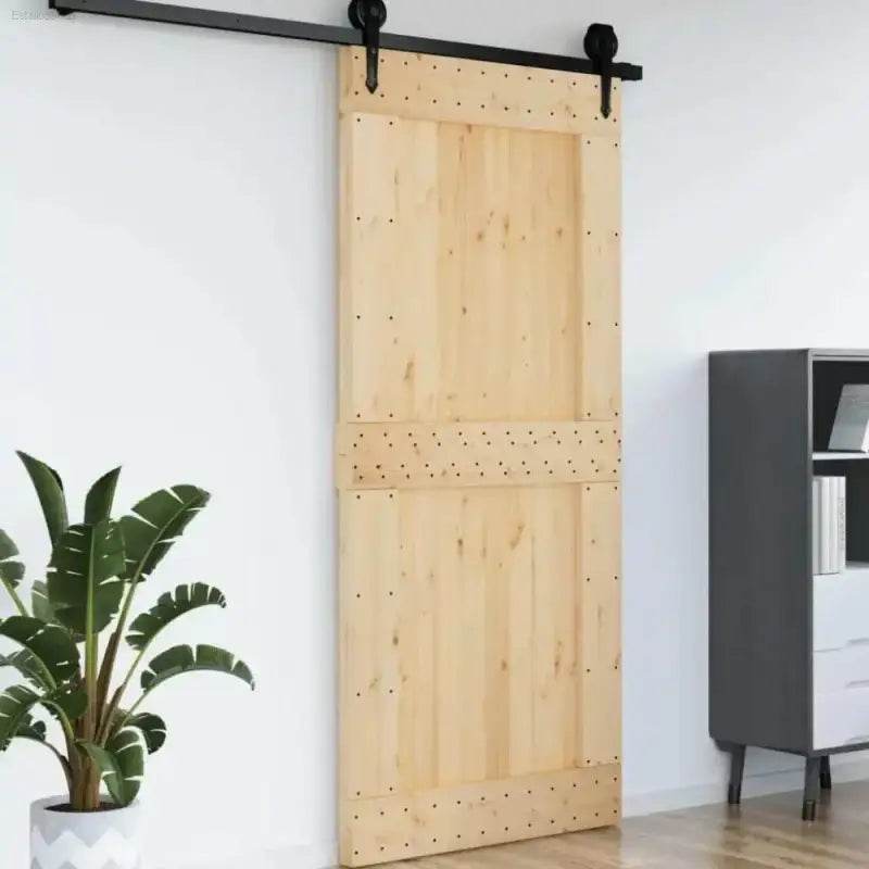 Barn Door Bliss: Black Hardware, Rustic Charm! Unleash rustic elegance with our Wooden Barn Doors, complete with sleek black hardware. These doors instantly transform - Estalios