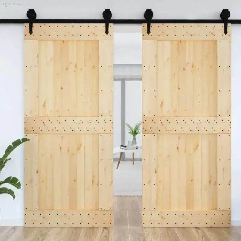 Barn Door Bliss: Black Hardware, Rustic Charm! Unleash rustic elegance with our Wooden Barn Doors, complete with sleek black hardware. These doors instantly transform - Estalios