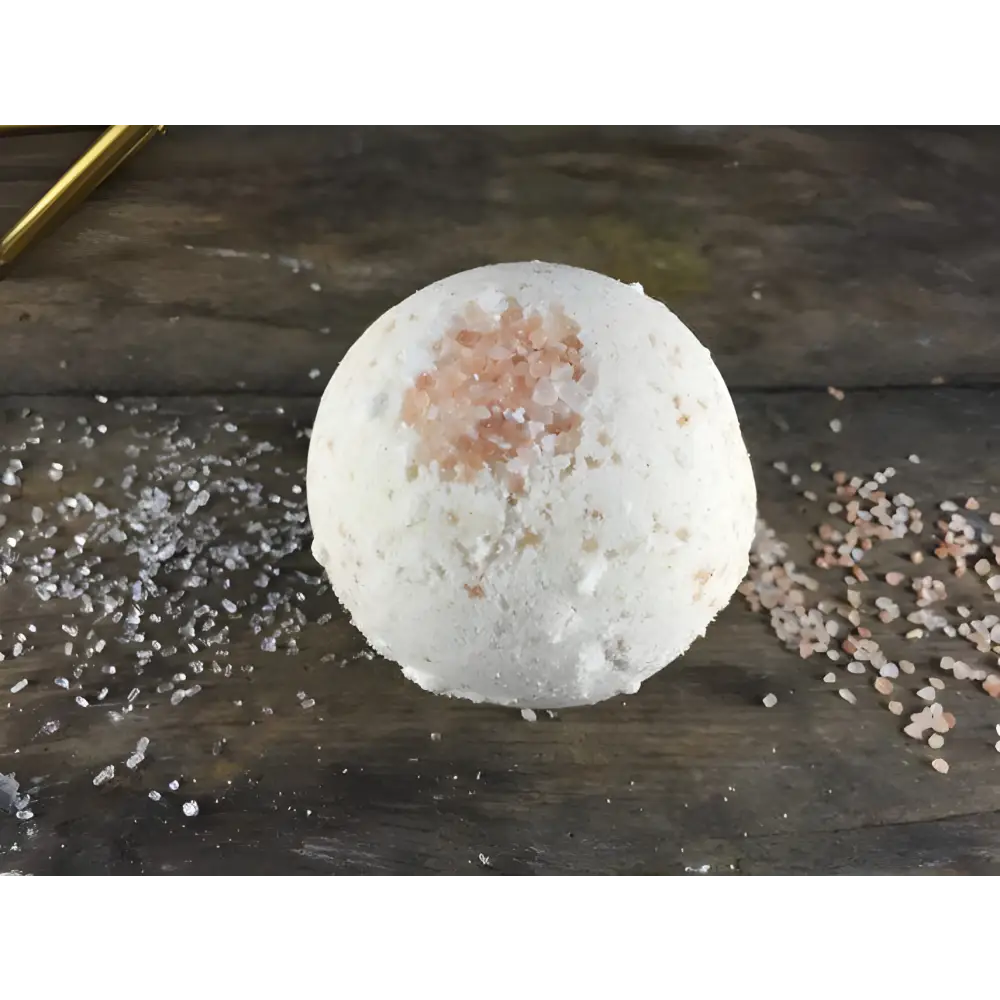 Round bath bomb with pink salt for soothing skin, perfect for large organic psoriasis