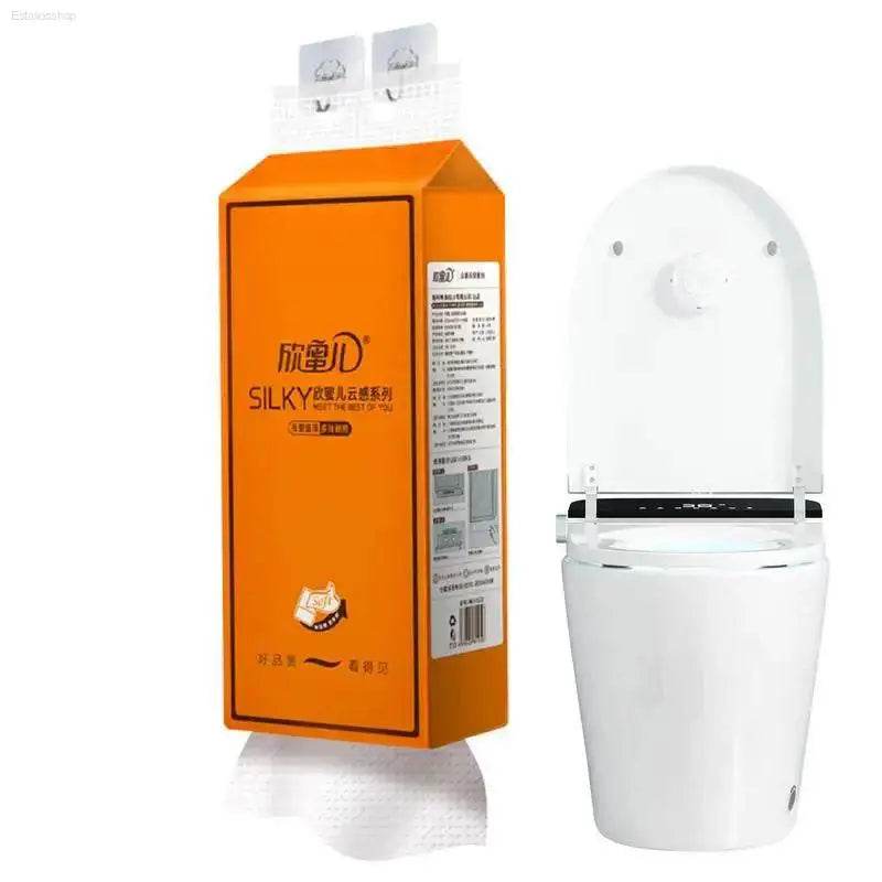 White smart toilet and orange tissue box.